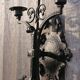 Pair of black wrought iron wall sconces - neo-Gothic style - from the 1950s