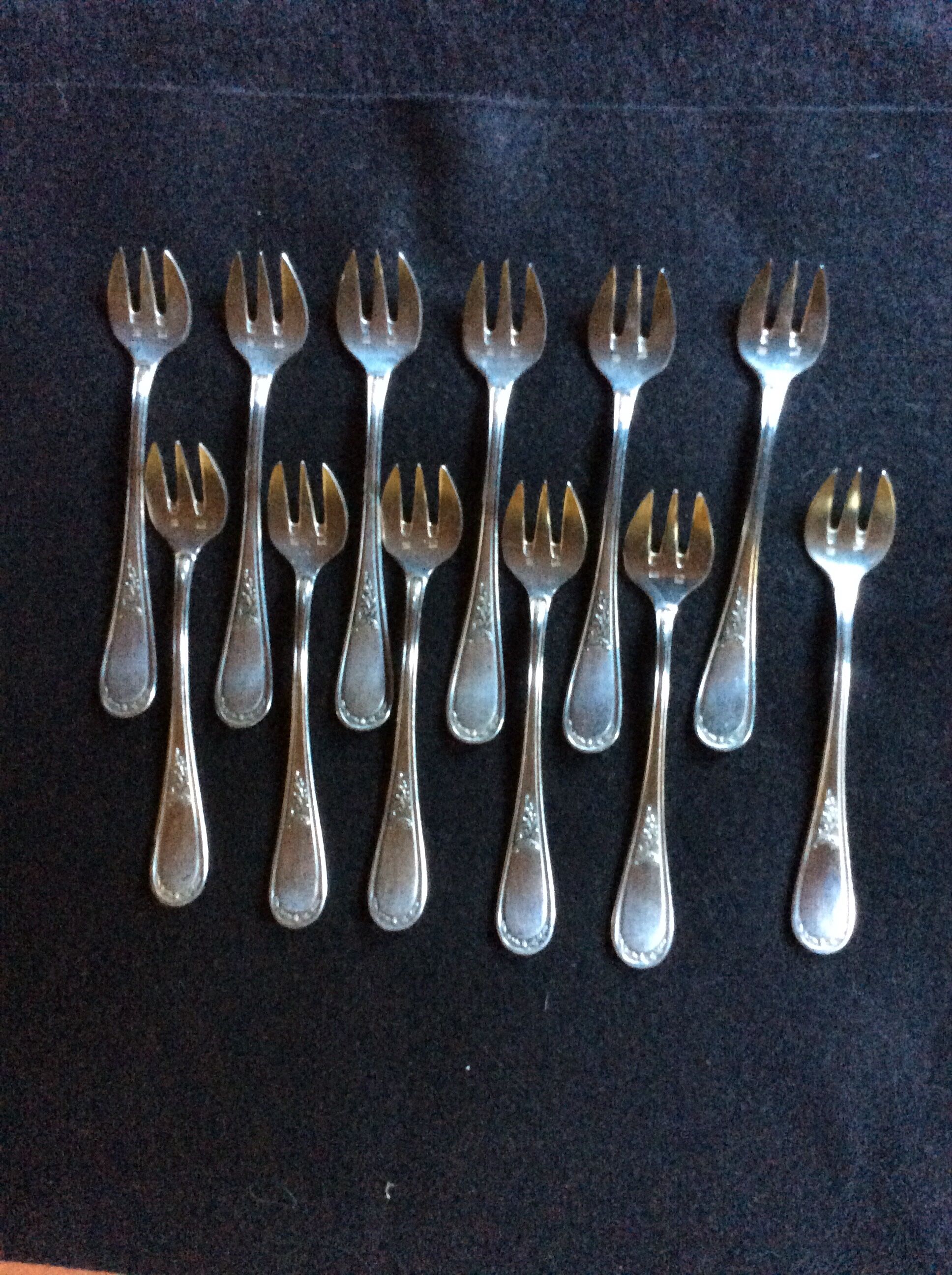 12 oyster forks