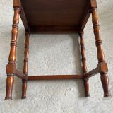 2 wooden nesting tables with molded legs