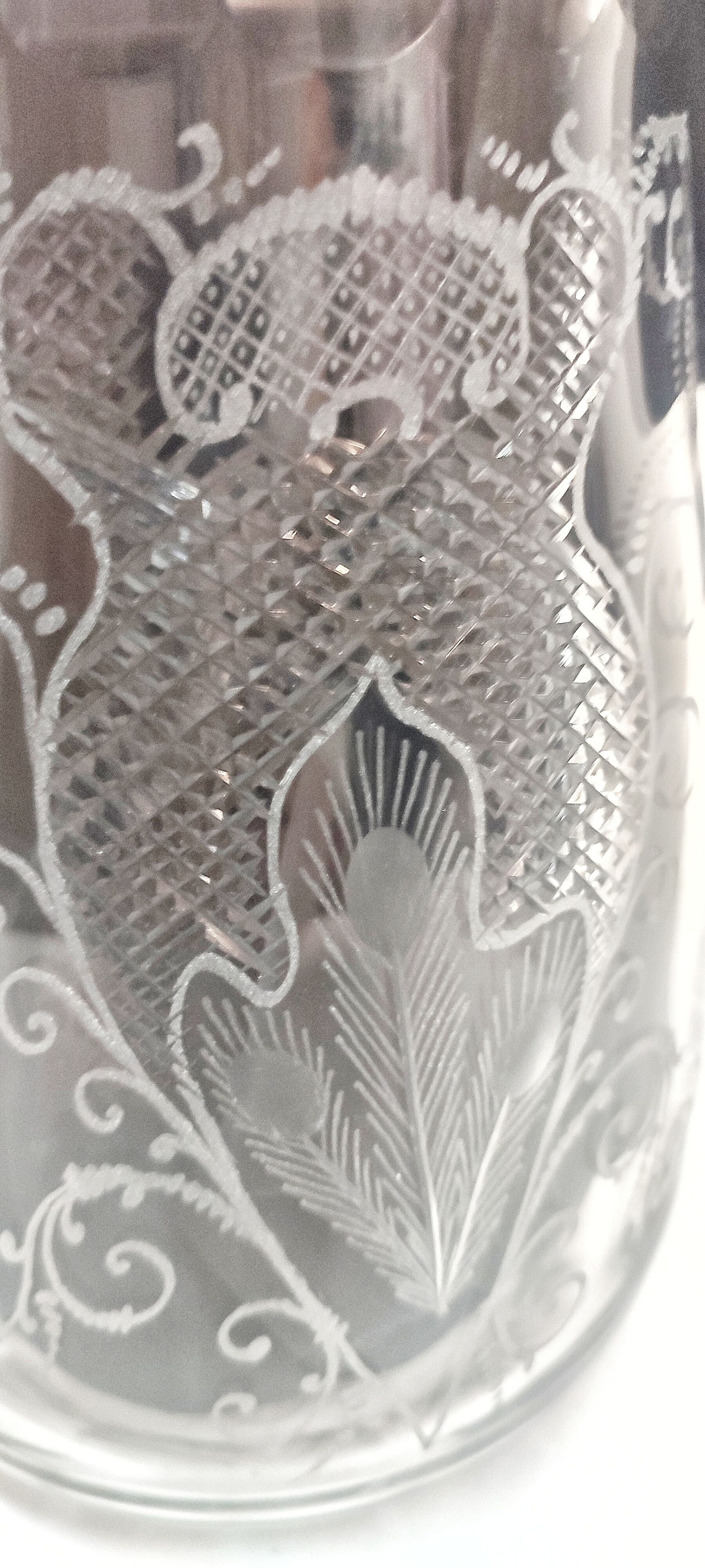 Hand-carved glass jug. France, 1950s.