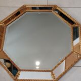 Octagonal mirror with golden wood frame