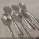 6 individual silver-plated metal sauce spoons with hammered baguette handles