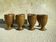 Eight vintage stoneware walking glasses