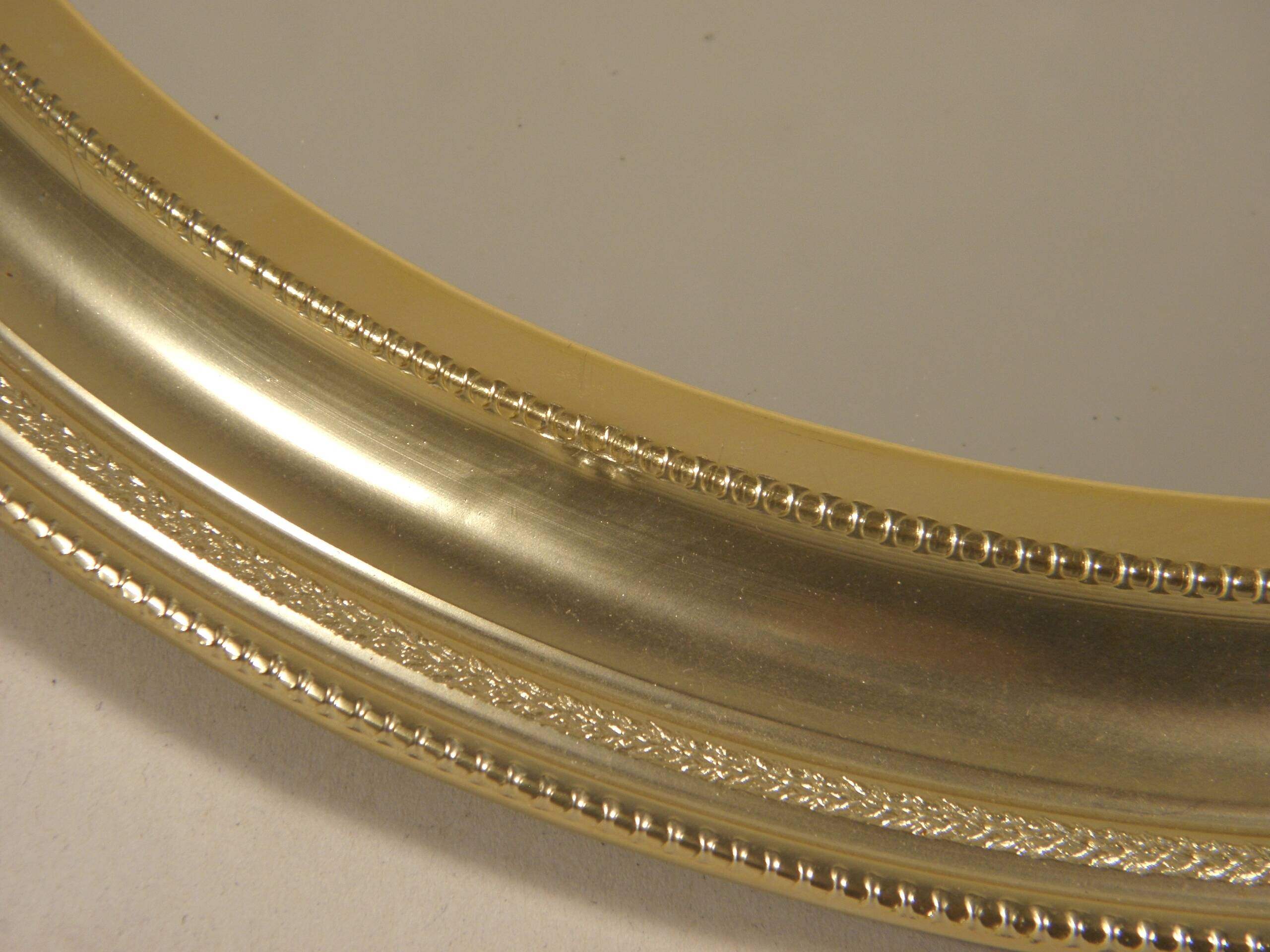 Round mirror in gilded metal 24 cm