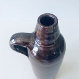 Ancient bottle with handle