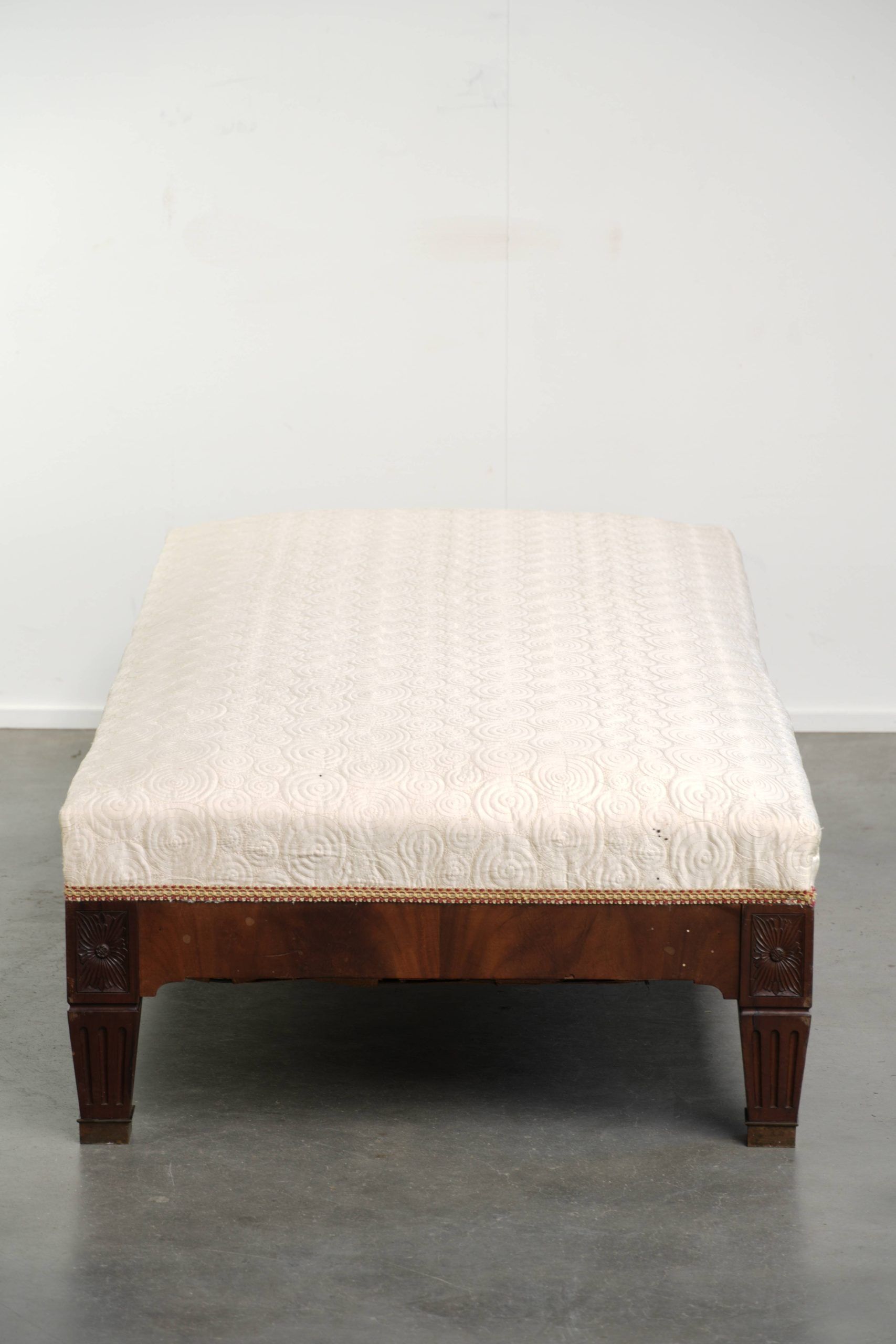 Antique French sofa from the 19th century in Empire style with a silk seat