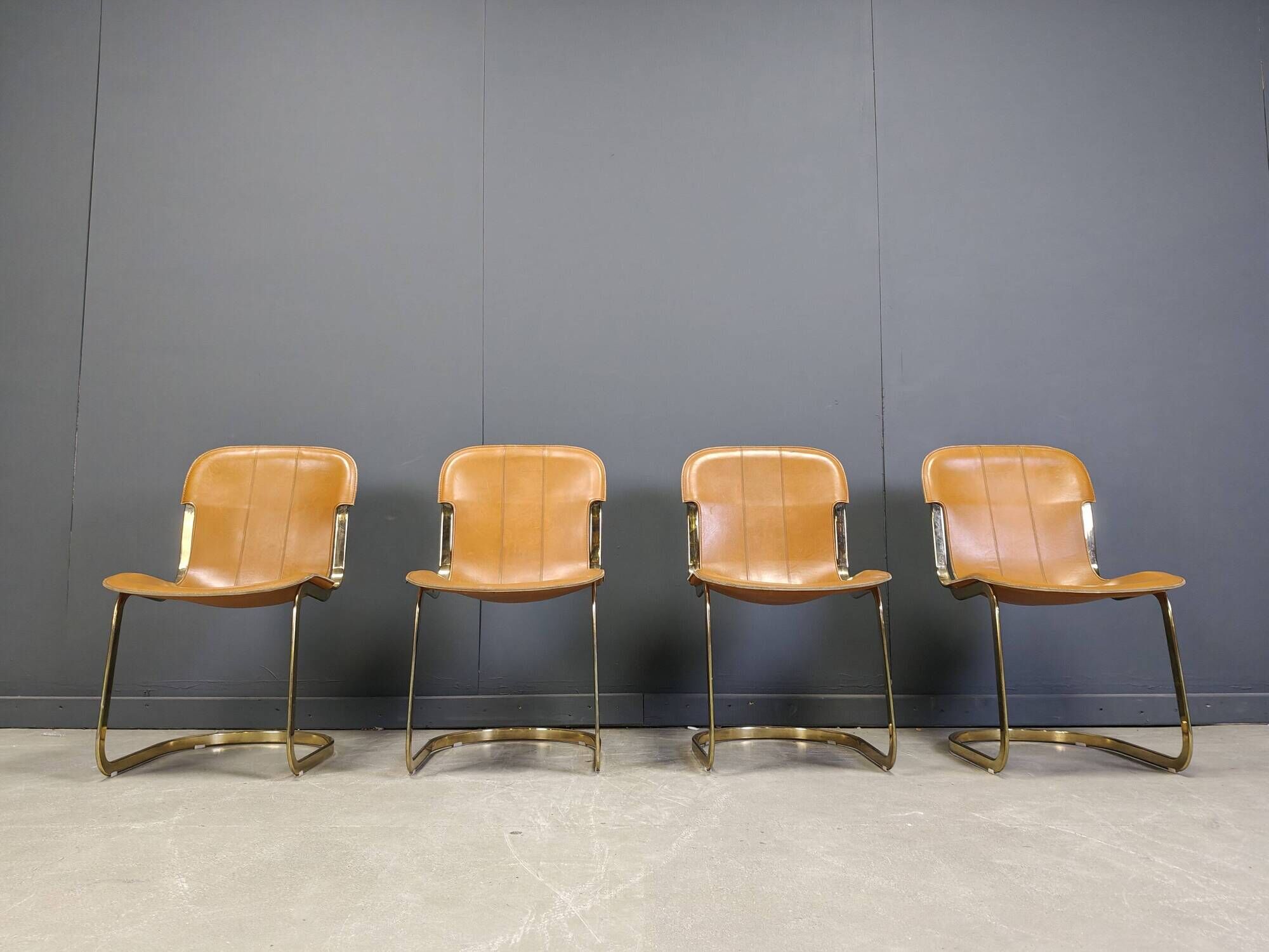 Vintage brass and cognac leather dining chairs by Willy Rizzo for Cidue set of 4