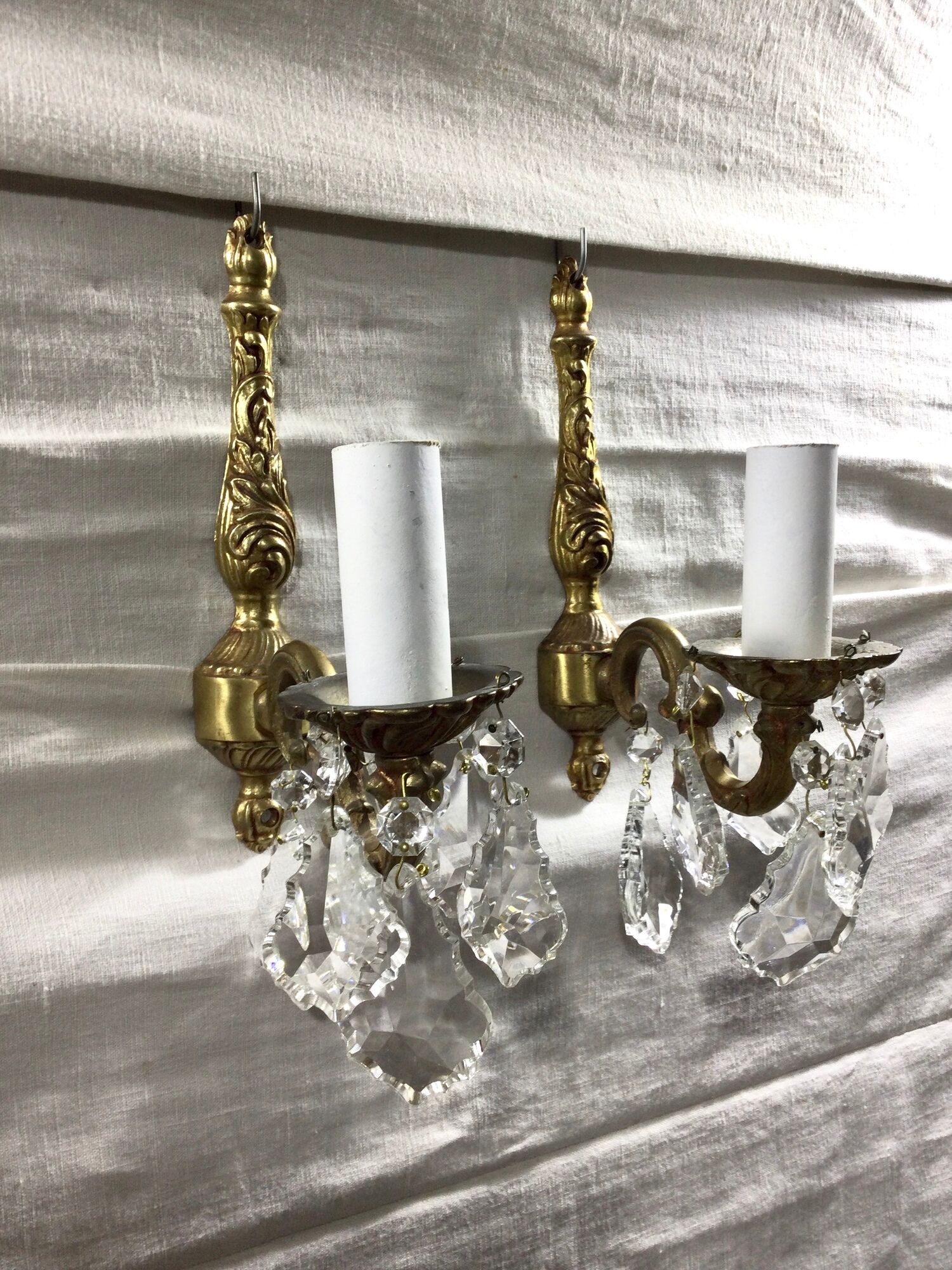 Pair of 1-light bronze sconces and Louis XV style stamps