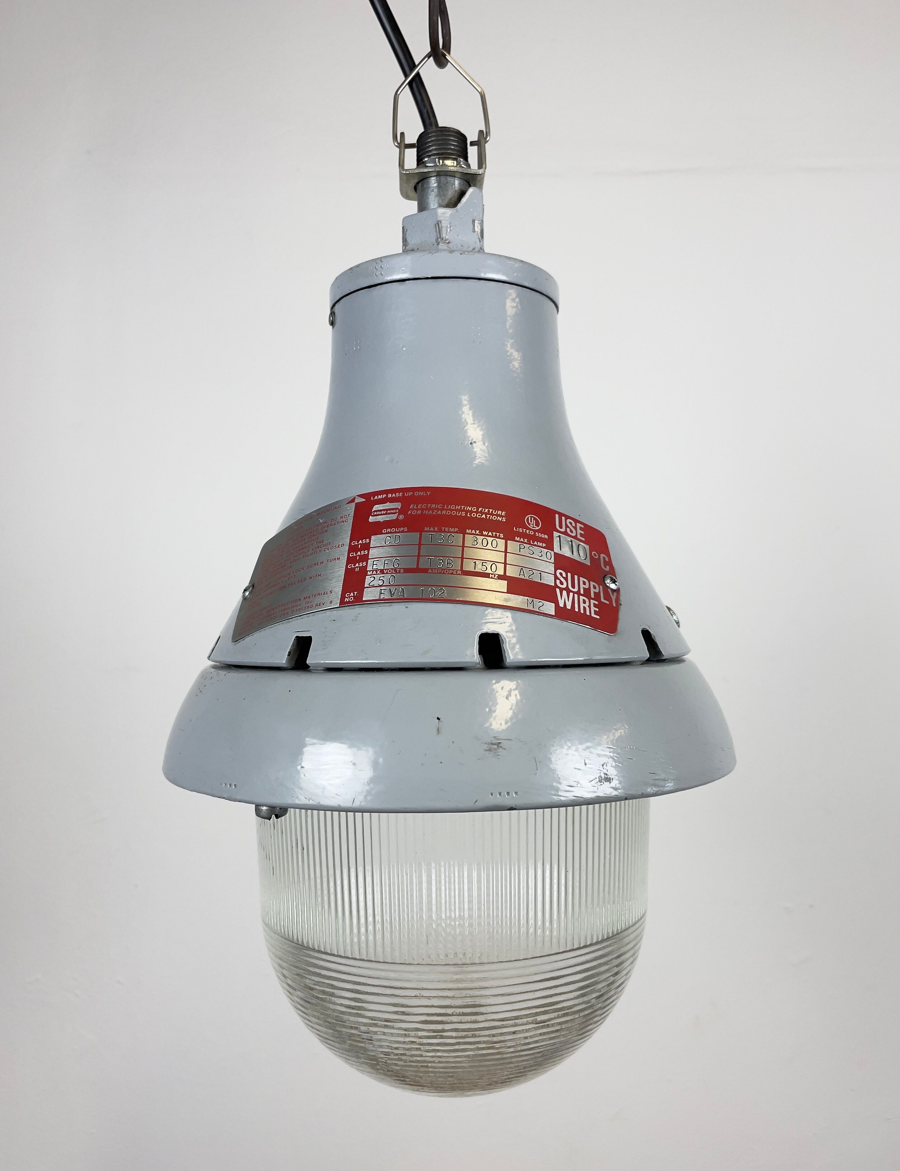 Grey industrial explosion proof light from Crouse-Hinds, 1970s
