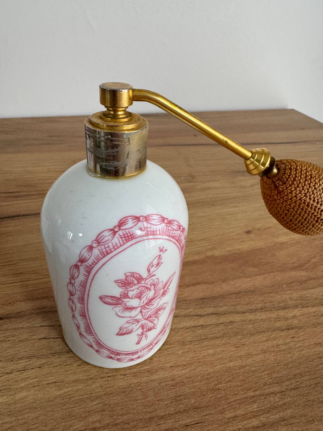Vintage perfume bottle and spray.