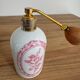 Vintage perfume bottle and spray.