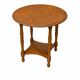 Occasional table in antique oak with spool legs.