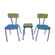Two chairs and a yellow and blue stool in formica