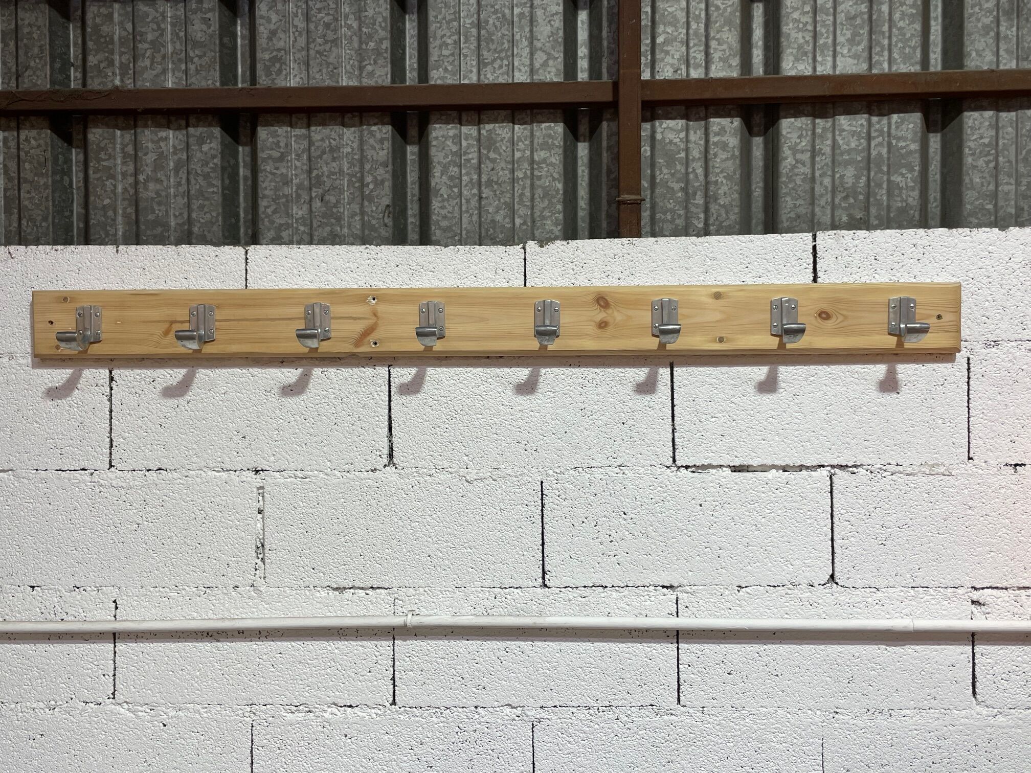 Vintage wall coat rack from the 1960s.