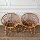 Paire de fauteuils corbeille en rotin , années 50-60