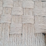 Vintage handmade wooden stool and rope