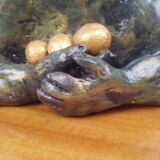 Clay sculpture of mother nature holding eggs, vintage modern figurative art