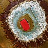 Vintage ceramic coffee table (atomic pattern) with a chrome base.