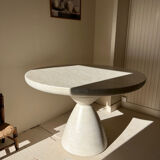 Travertine-effect stone dining table