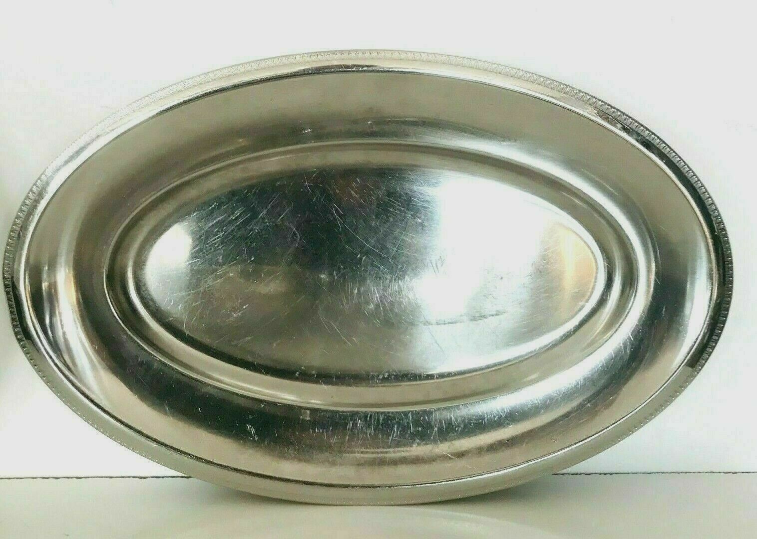 Lot of four dishes and two silver metal steels Maison Royal BB France