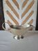 Silver-plated metal gravy boat