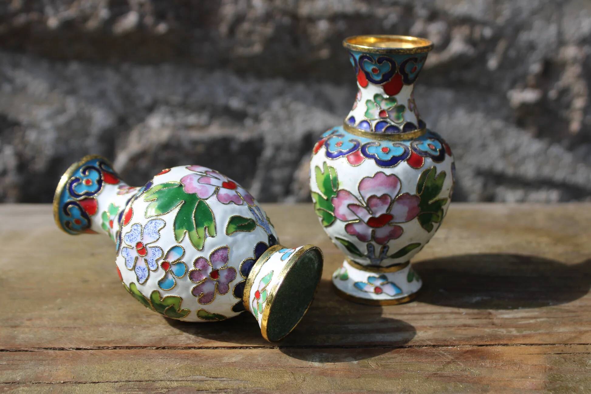 Two small vintage cloisonné enamel vases with Asian floral decoration.