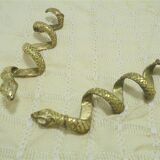 Pair of golden snakes