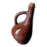 Rare et anciennce cruche pansue marron foncée. Fabriquée à Cuba