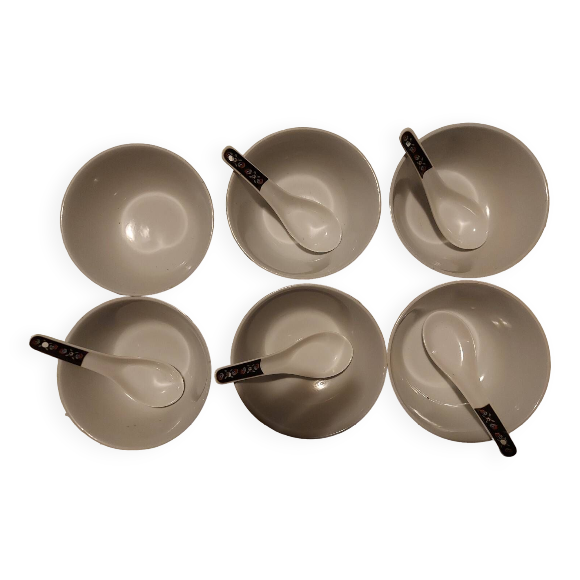 Set of oriental bowls and spoons