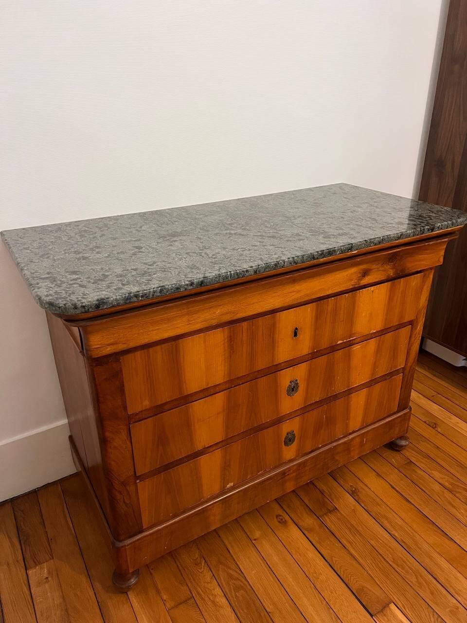 19th-century commode with a marble top