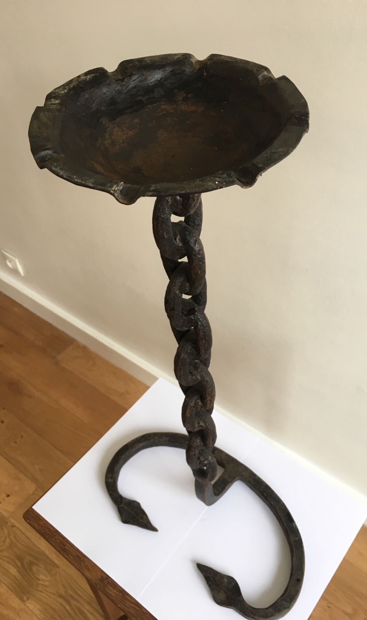 Wrought iron ashtray on its chain and anchor foot