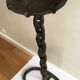 Wrought iron ashtray on its chain and anchor foot