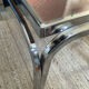 Vintage coffee table in stainless steel and ceramic from the 1970s.