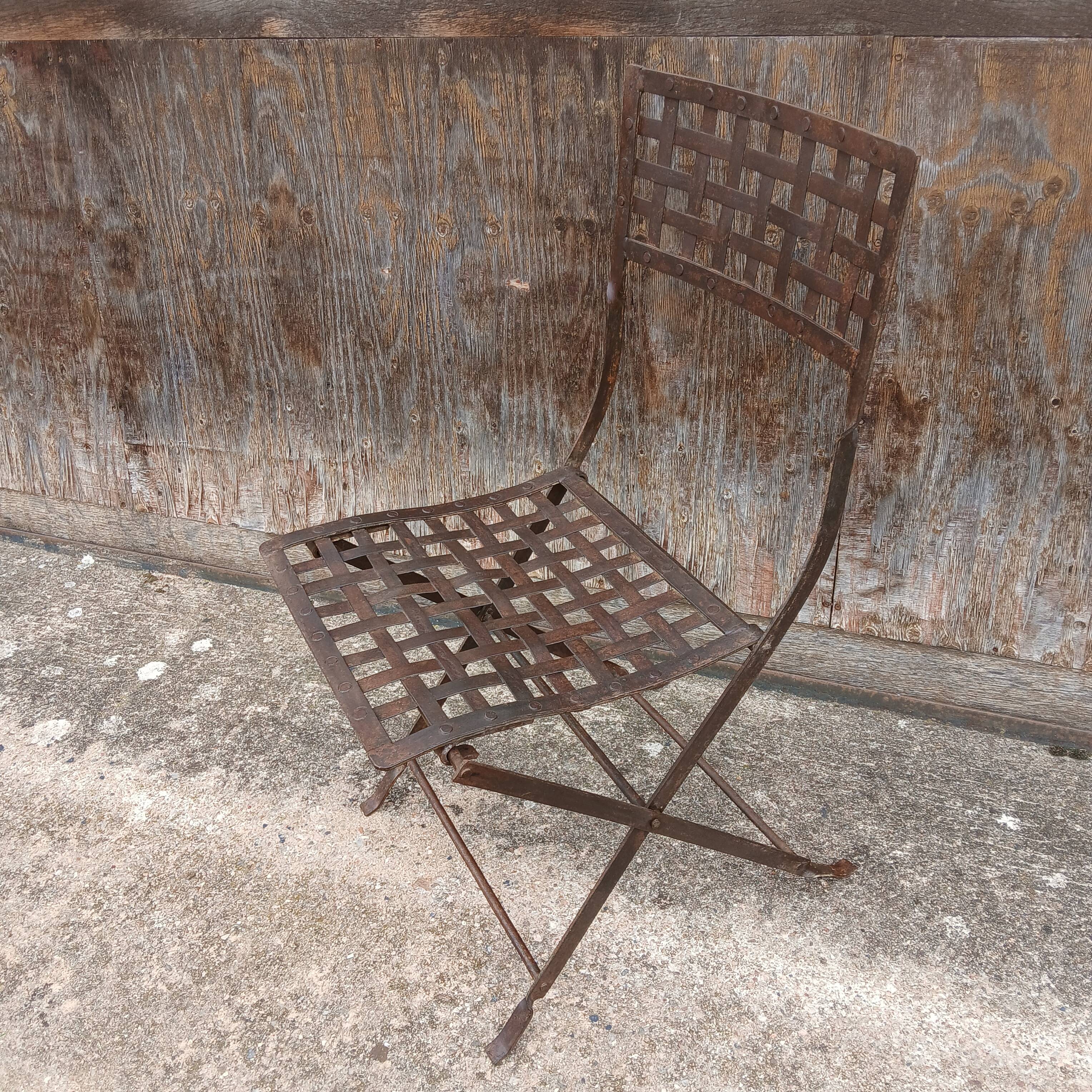 3 wrought iron chairs