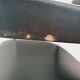 Pair of black skaï and chrome armchairs