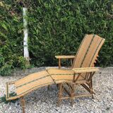 Rattan lounger with foot rest