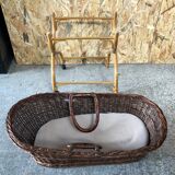 Old woven wicker baby cradle