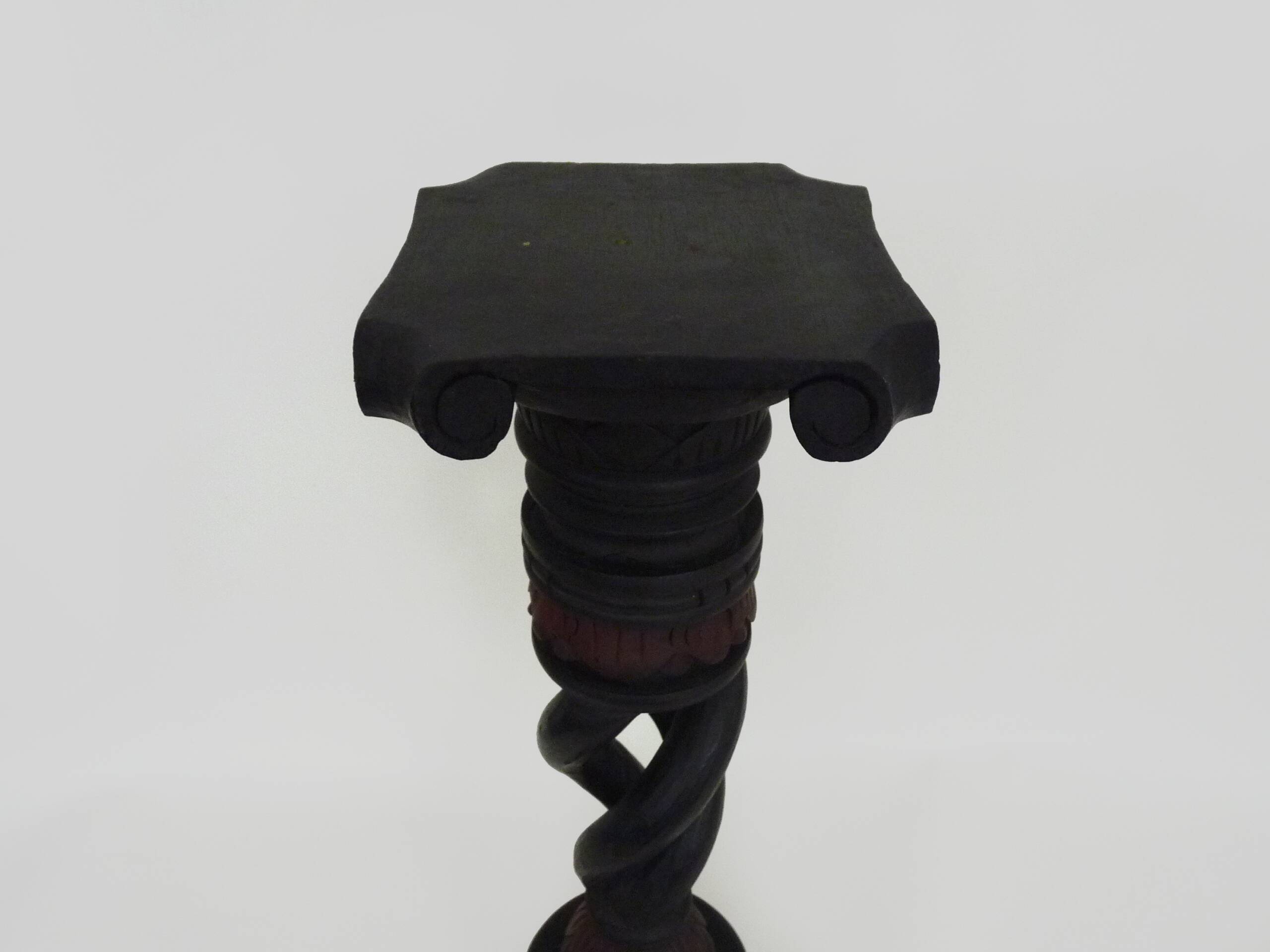Twisted and engraved blackened wooden pedestal. 1960s 70s.