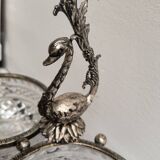 Crystal bowls joined by "swan neck" creation.