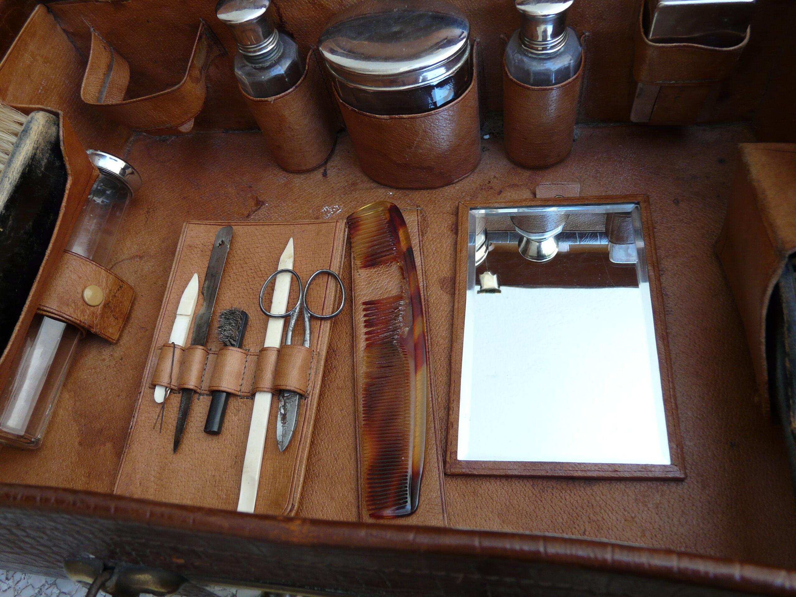 Leather and brass nineteenth monogrammed MCS suitcase