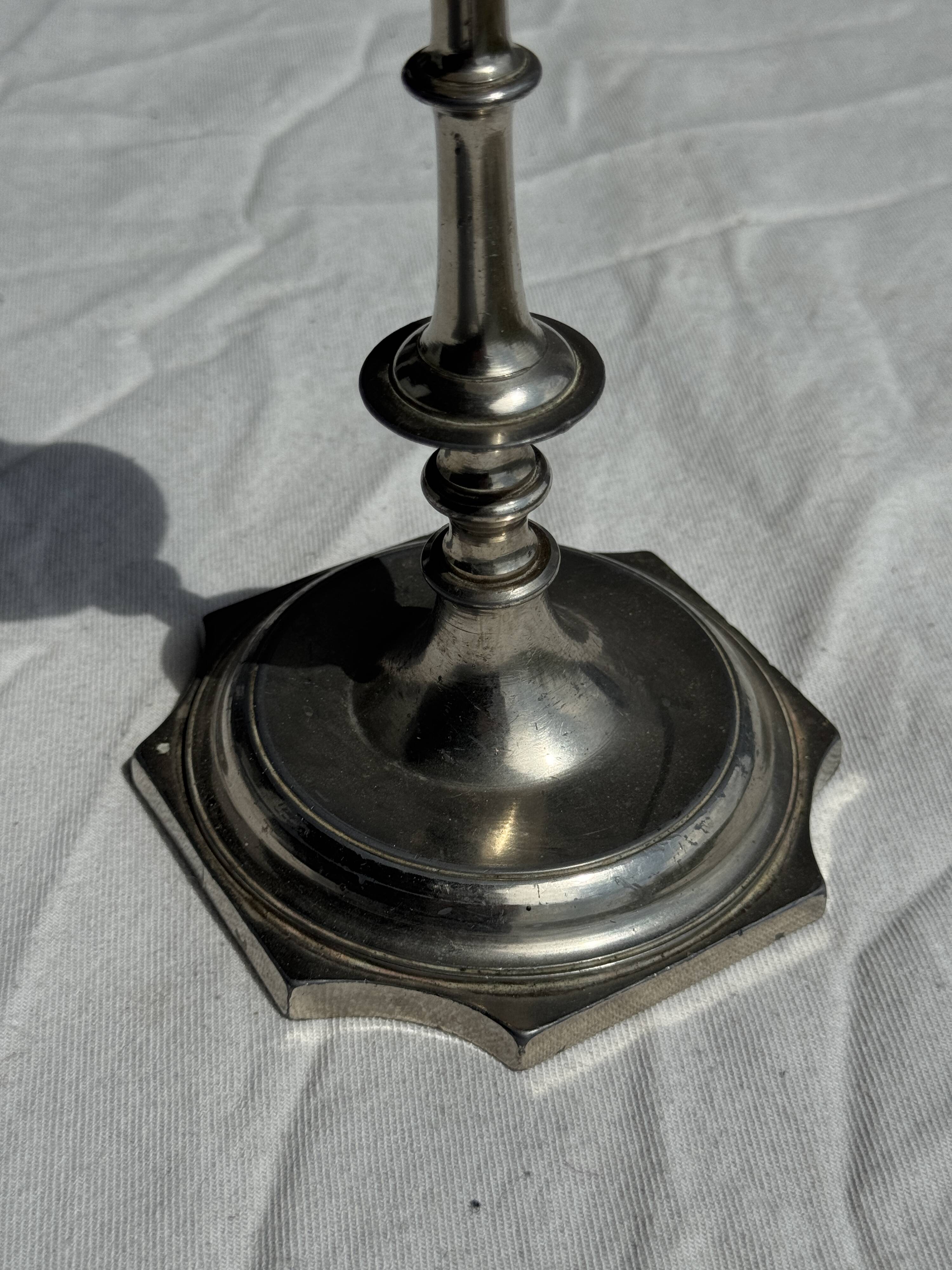 A large silver candlestick holder H23