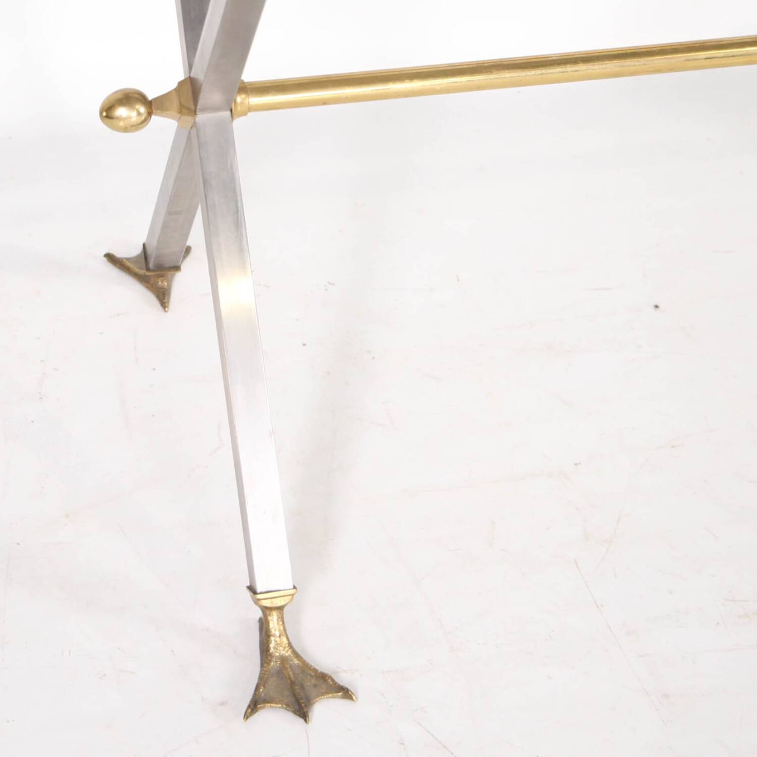 Stainless steel and brass table