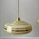 Pair of suspensions in yellow Clichy glass and golden border 40s-50s