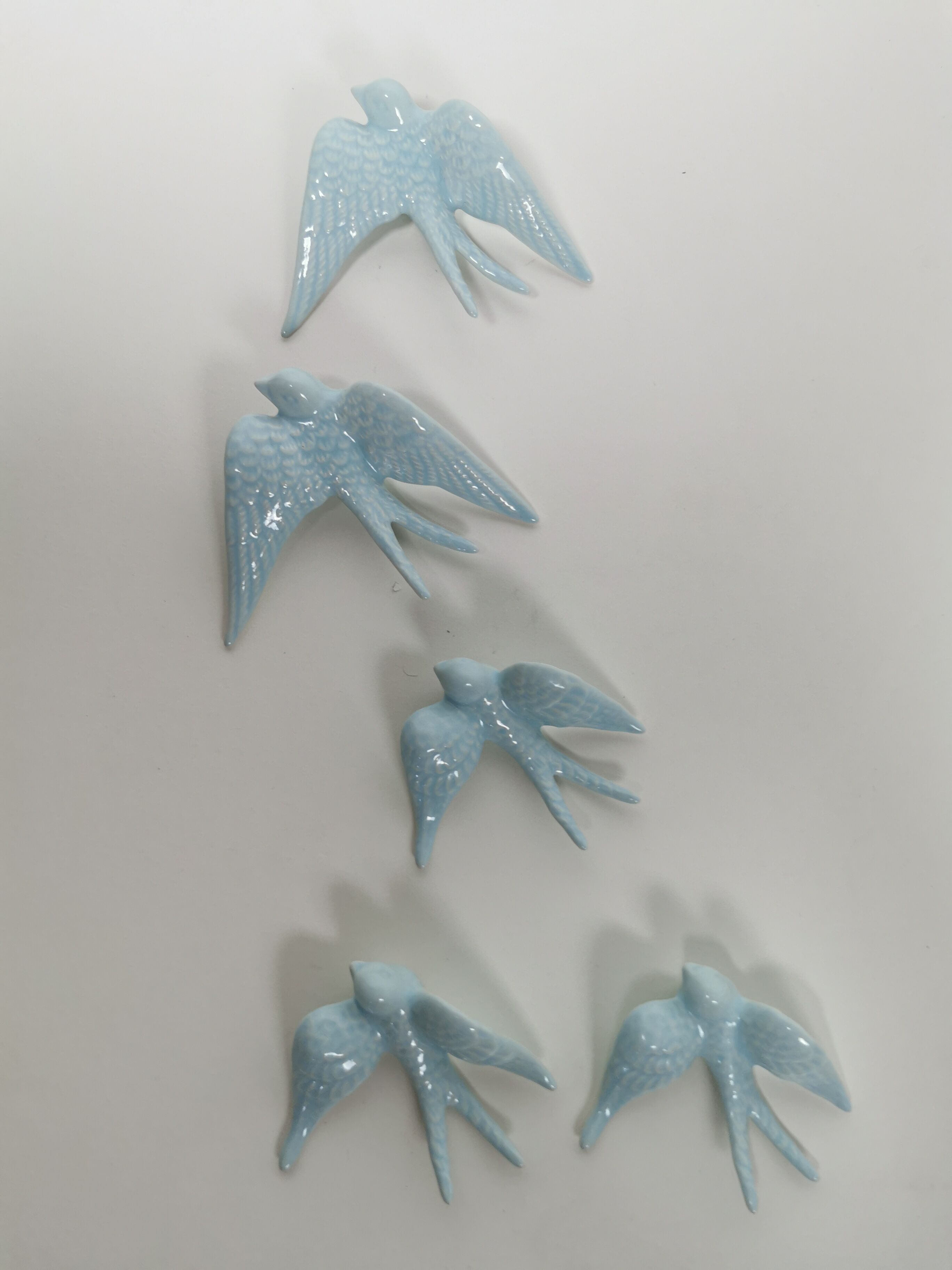 Batch of swallows in ceramic