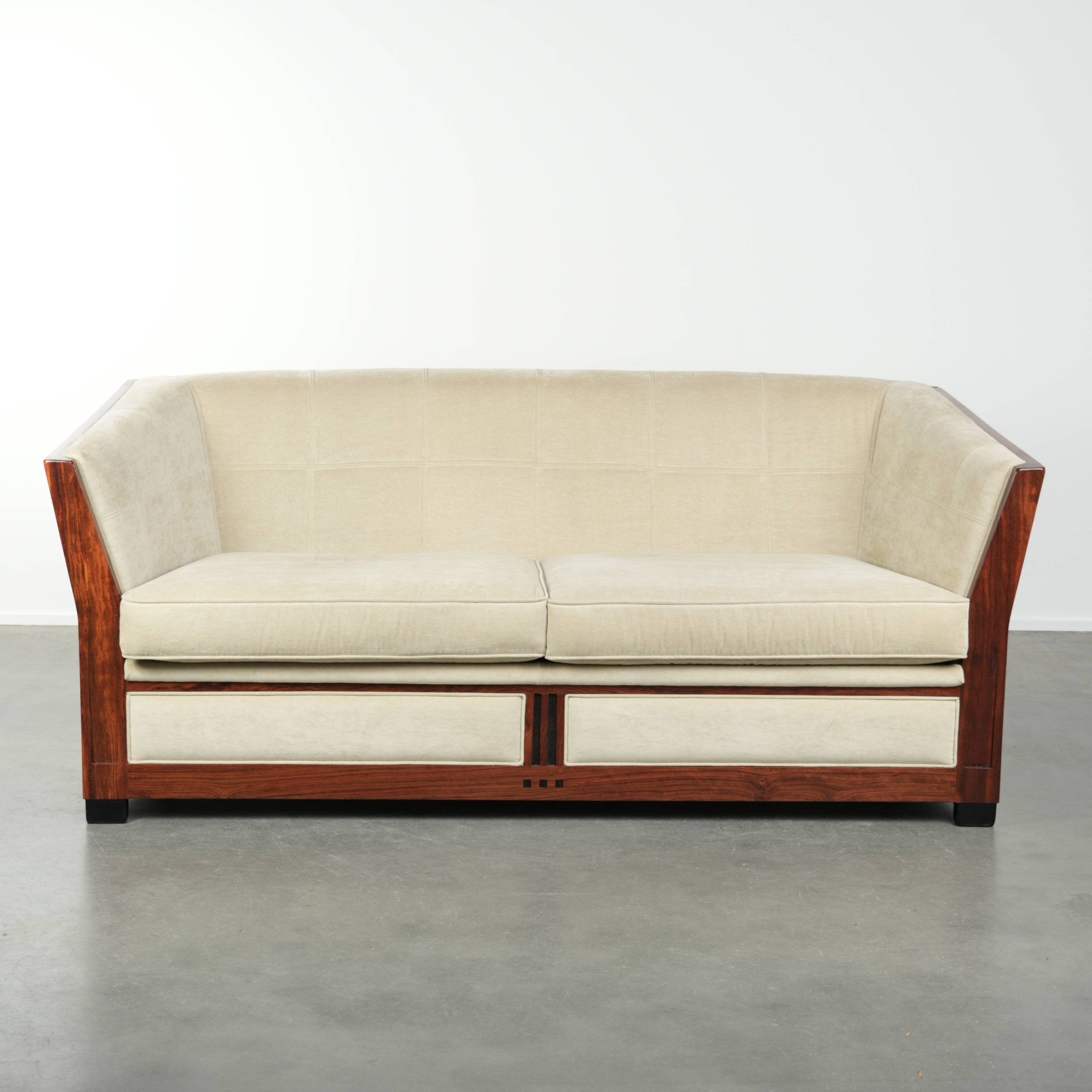 Art Deco design sofa with beautiful woodwork and cream fabric upholstery