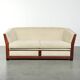 Art Deco design sofa with beautiful woodwork and cream fabric upholstery