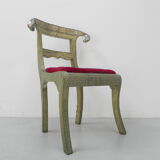 Dining chair upholstered with stamped tin