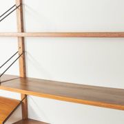 Classic shelving system from the 1960s in teak veneer by Poul Cadovius for Cado