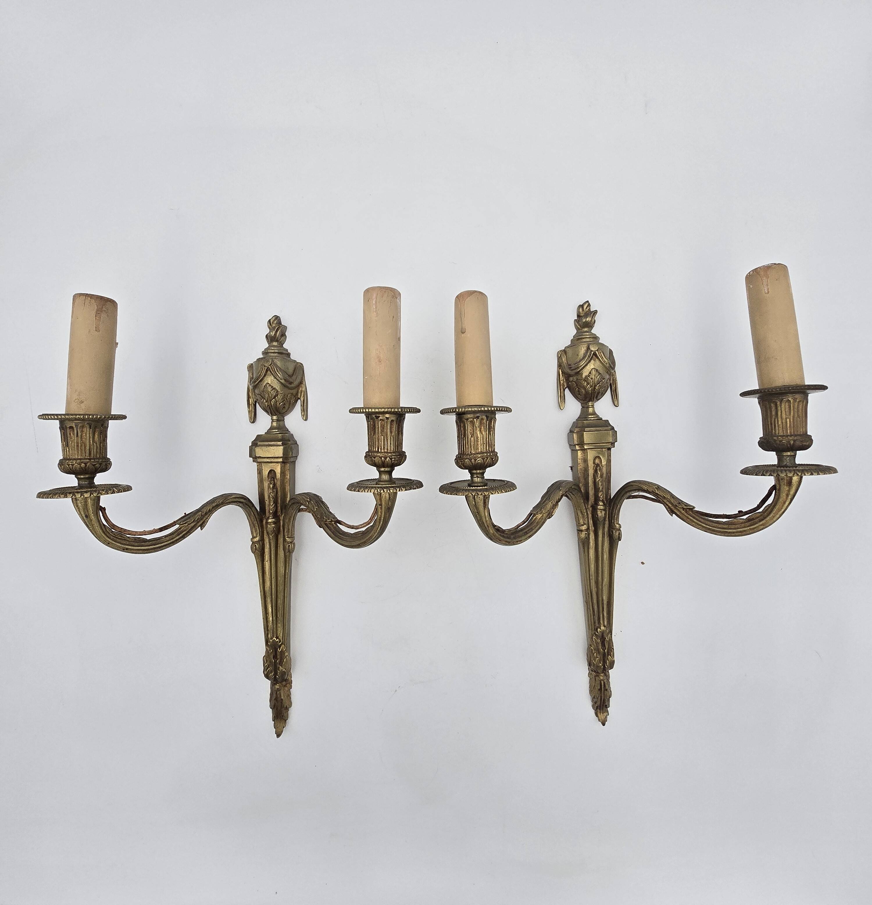 Pair of antique Louis XVI style bronze wall lights