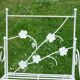 Folding white wrought iron shelf